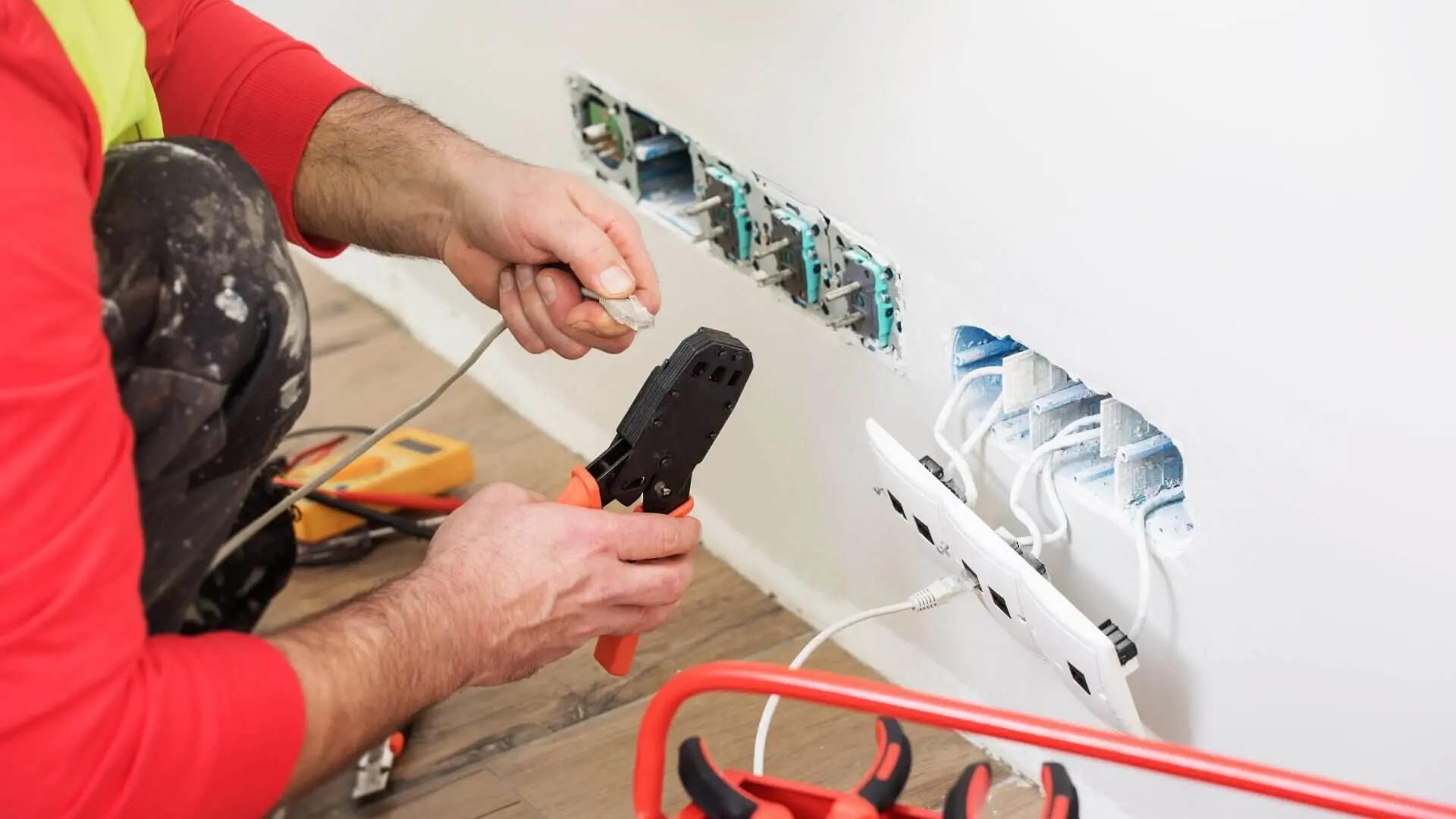 electrician fixing residential electrical wiring